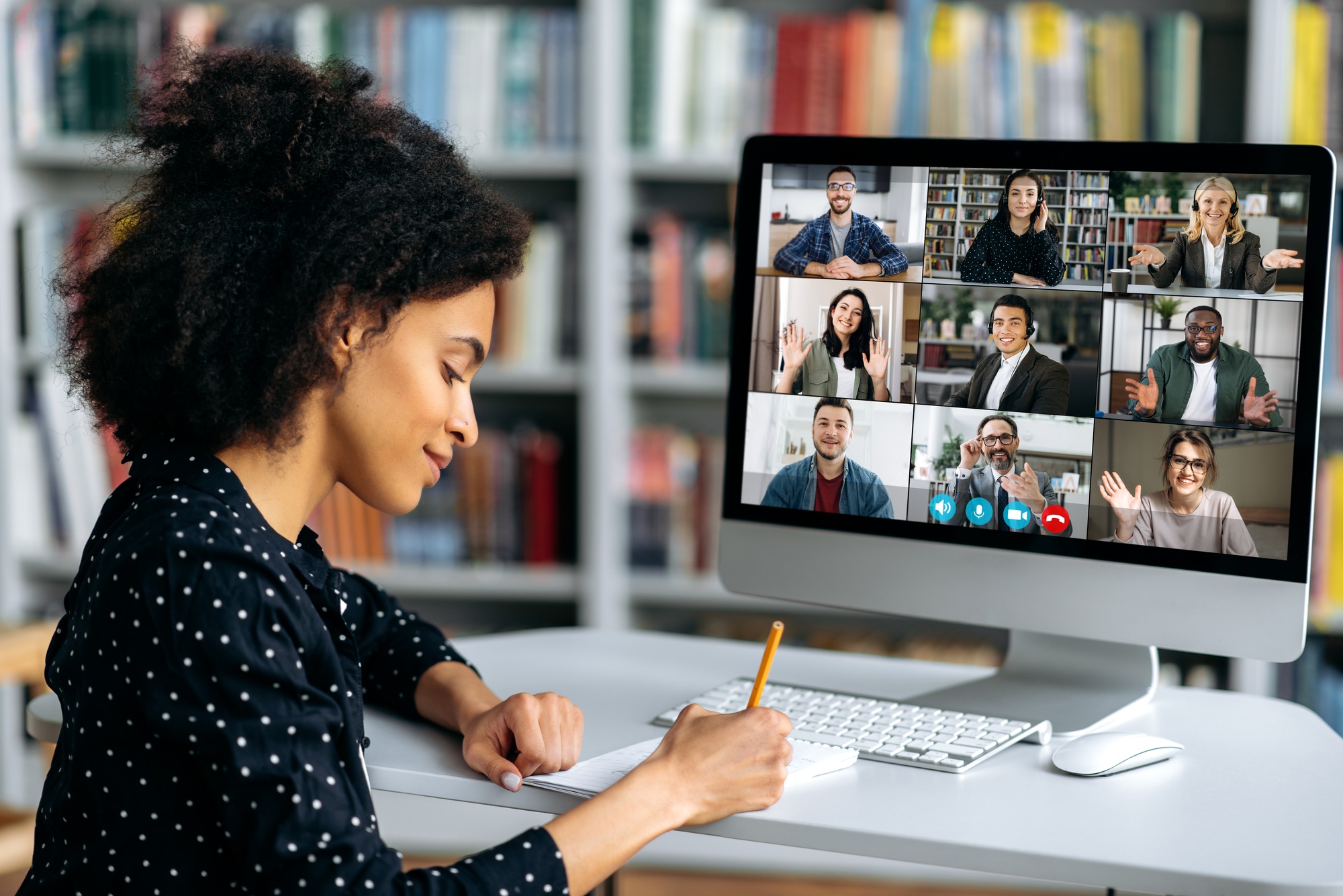Video call, online conference using app and computer. African American female student, studying